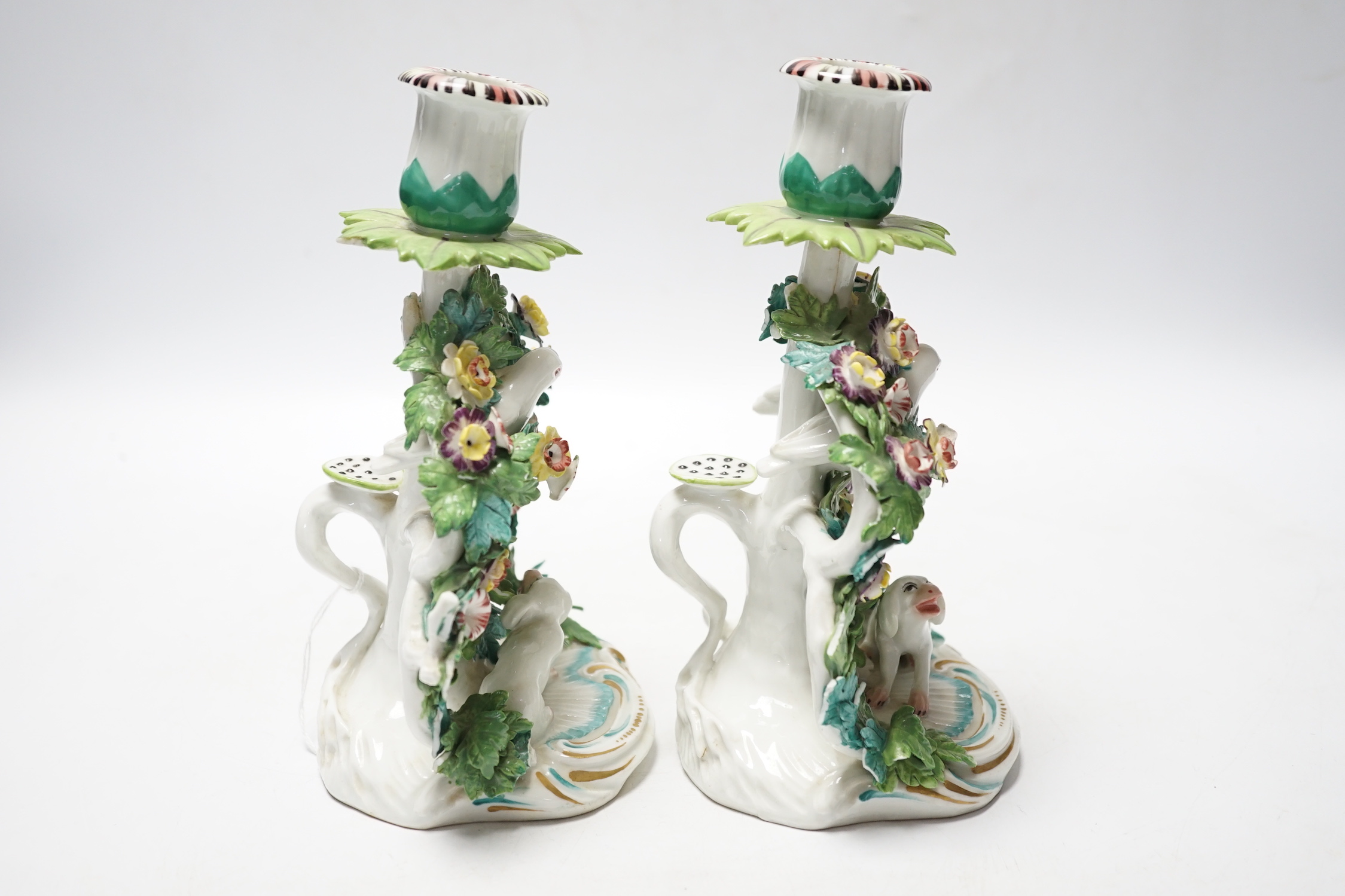 A pair of Samson porcelain chambersticks, in Derby style, with floral encrusted decoration, 19cm high